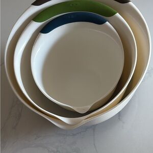 Oxo Nesting Mixing Bowls with Blue, Green, Black and Brown silicone grip edge.
